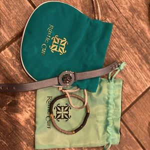 2 black and grey RC bracelets. One is adjustable